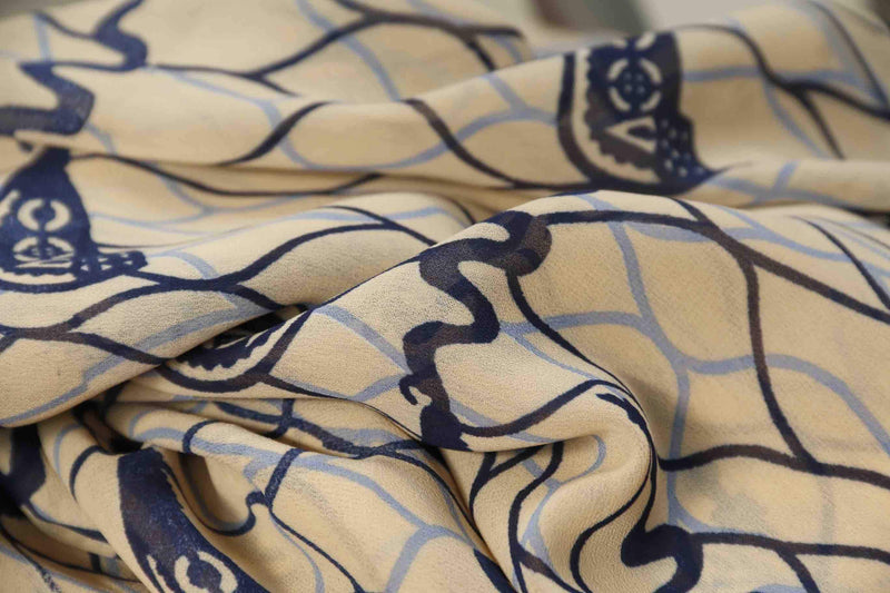 NAVY BLUE AND EGGSHELL CORKSCREW PRINT IN GEORGETTE